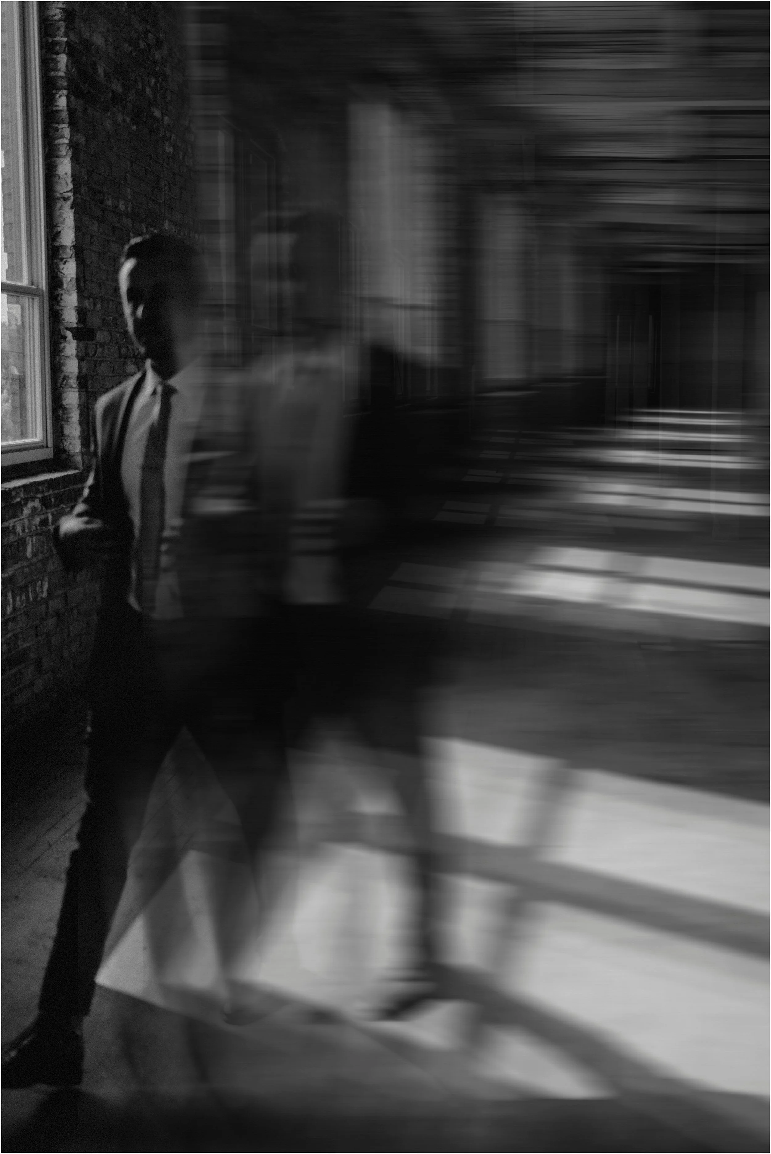 Joe walks through the window light