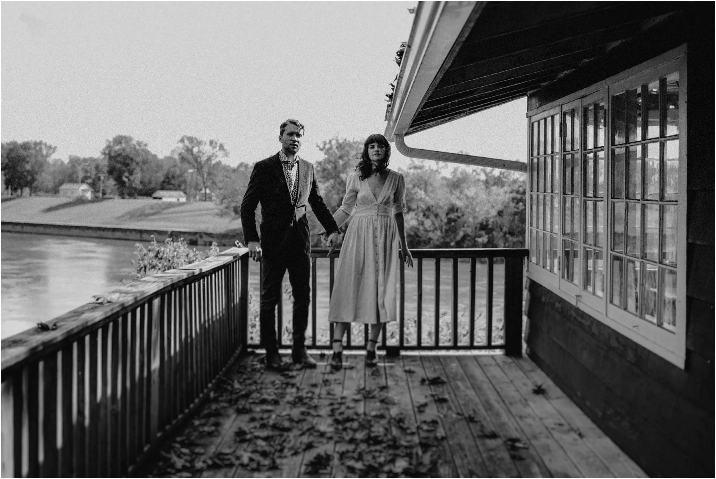 The wind blows the bride’s dress next to the Tennessee RIver