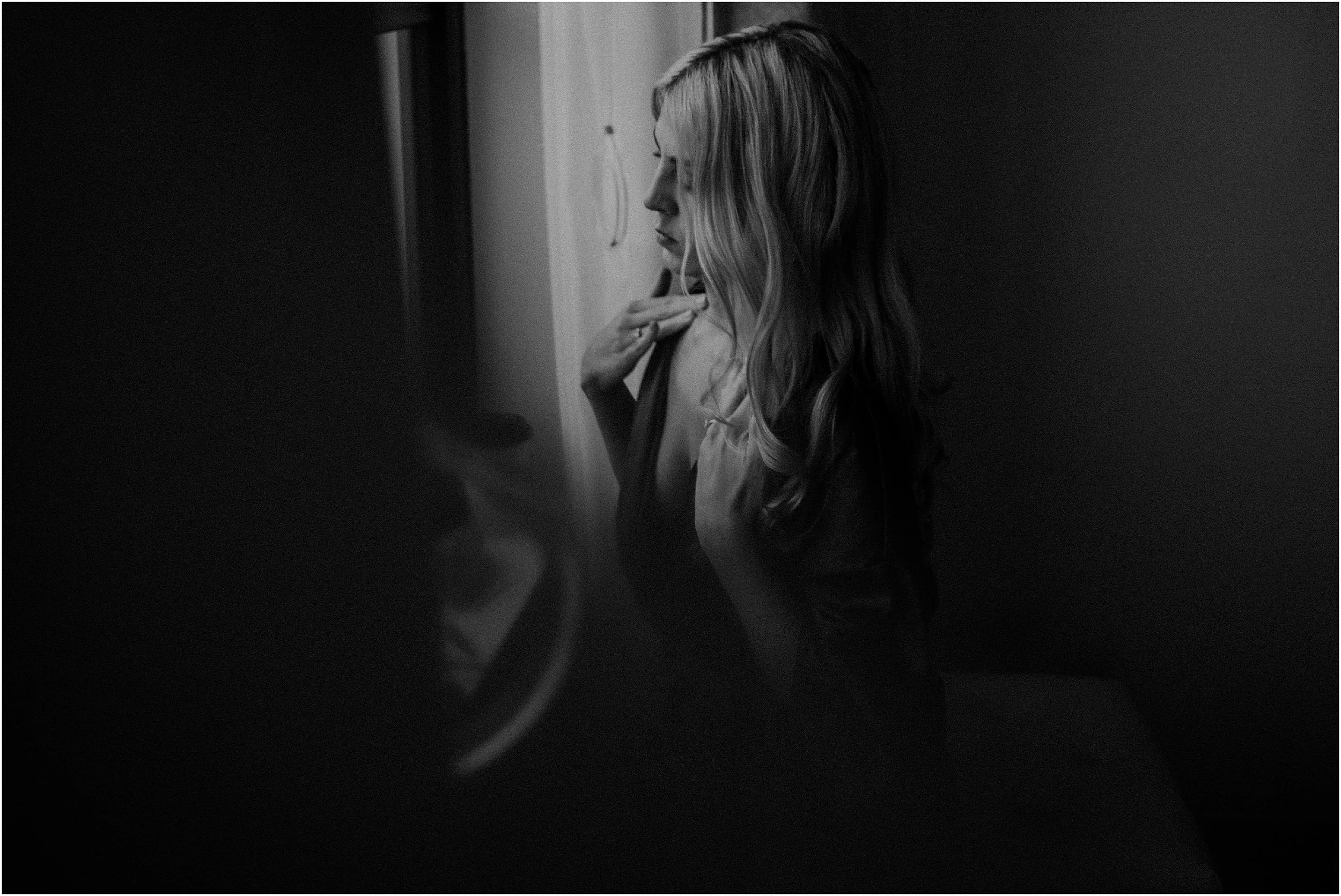 A quiet moment as the bride gets ready