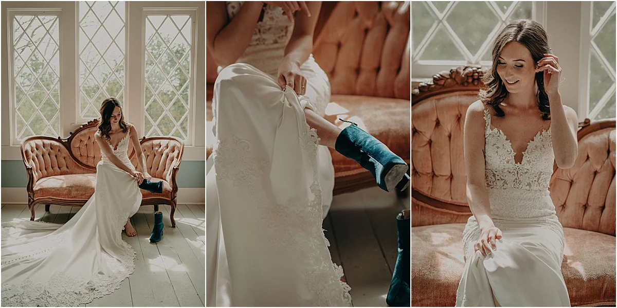 bride in white wedding dress putting on blue boots on antique couch