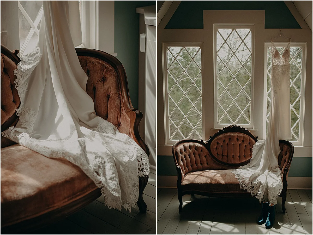 white wedding dress hanging over rustic antique couch