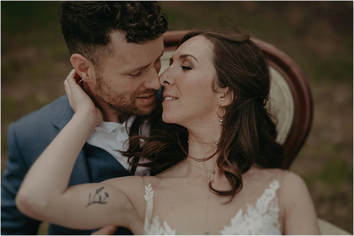 bride and groom nearly kissing