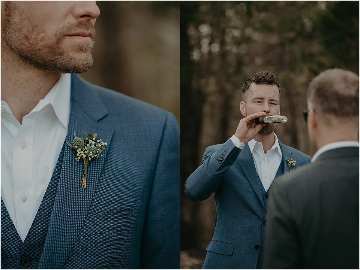 groom in blue suit drinking from a flask