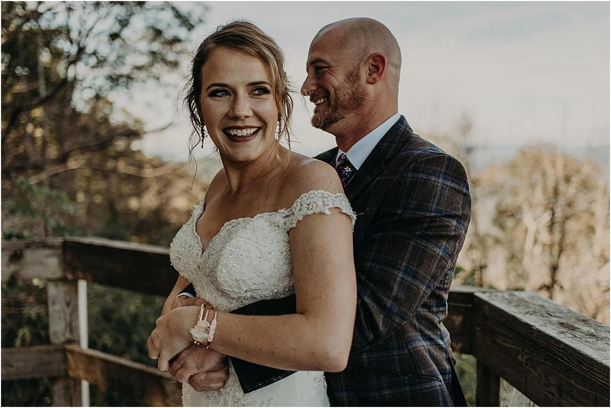 bride and groom embracing before ceremony