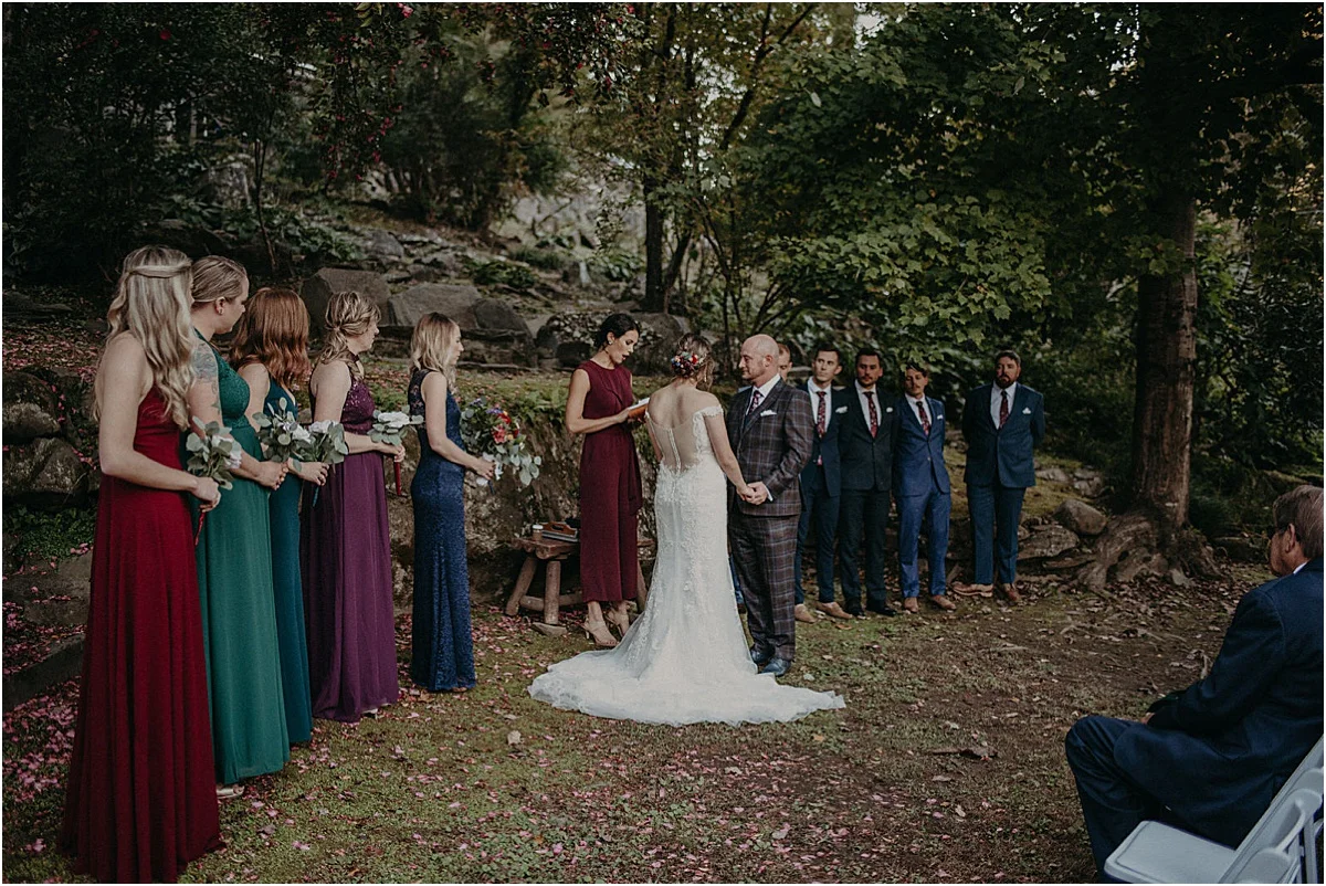 bride and groom standing at the altar