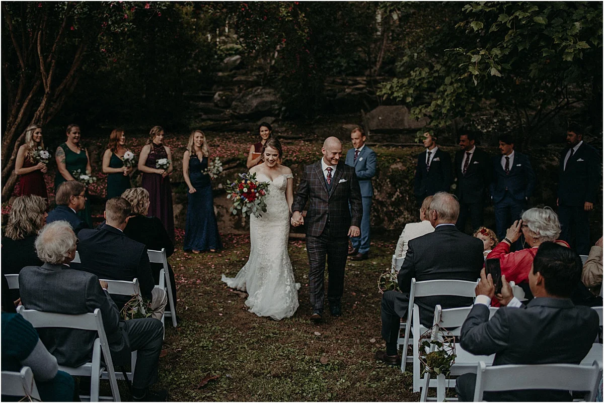 bride and groom walking down the aisle