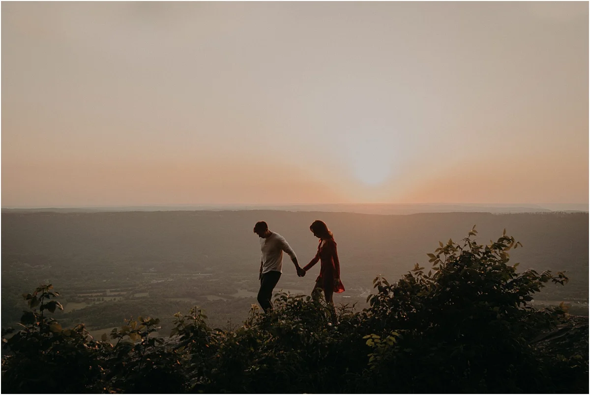 couple holding hands during engagement session in tennessee
