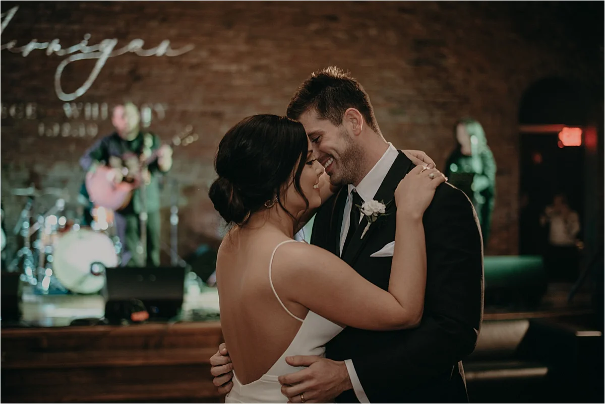 The newlyweds share their first dance in Church on Main