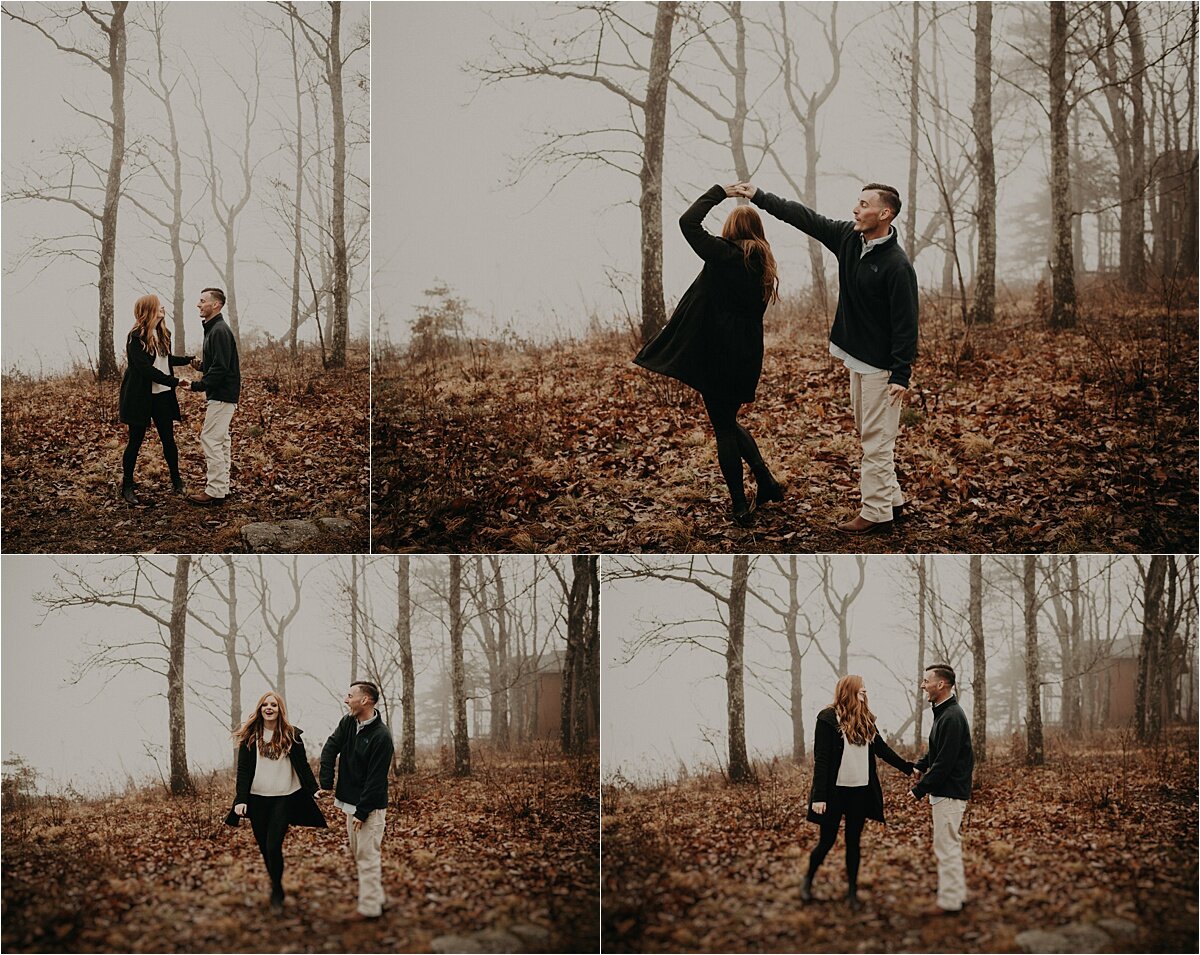 A stylish couple poses in the fog for their mountaintop engagement session