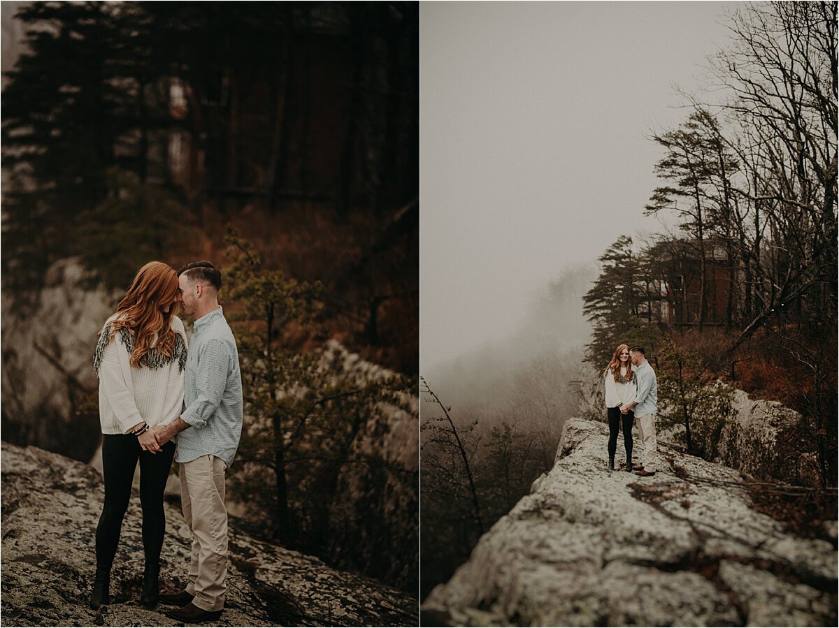This couple stands cliffside on Lookout Mountain during white out conditions