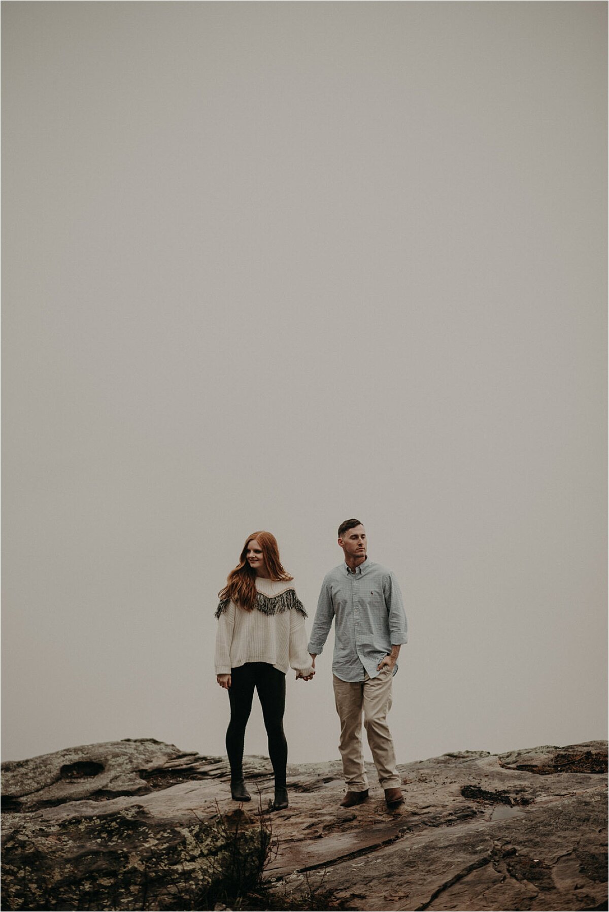 A foggy, white-out cloud engagement session on a mountain in Chattanooga, Tennessee