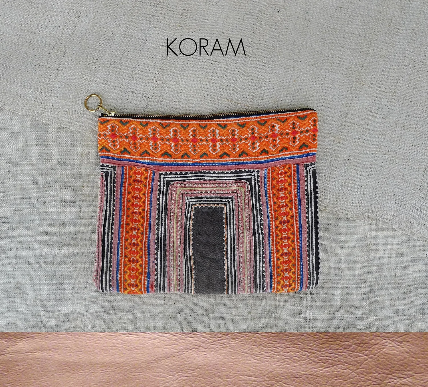 tribal textile + leather / zip fastening / inside pocket / name inspired by / The Karakoram mountain range - a large mountain range that sits on the borders of Pakistan, India and China. / approx size / 19cm x 24cm (7.5" x 9.5") / suitable as / tablet holder (iPad mini) / clutch bag / toiletries bag / general storage