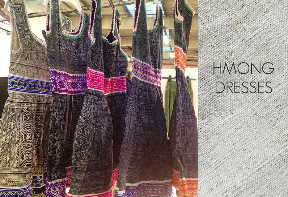 / collected / Girls' Hmong wax batik dresses from northern Vietnam from the Hmong tribe. Dyed with indigo dye with symbolic Hmong patterns and decorated with colourful embroidered ribbon. Each are different. / sizes available / Children's sizes only - typically ages 4 and under. Each is unique. / material / Cotton - wax batik + cotton ribbon