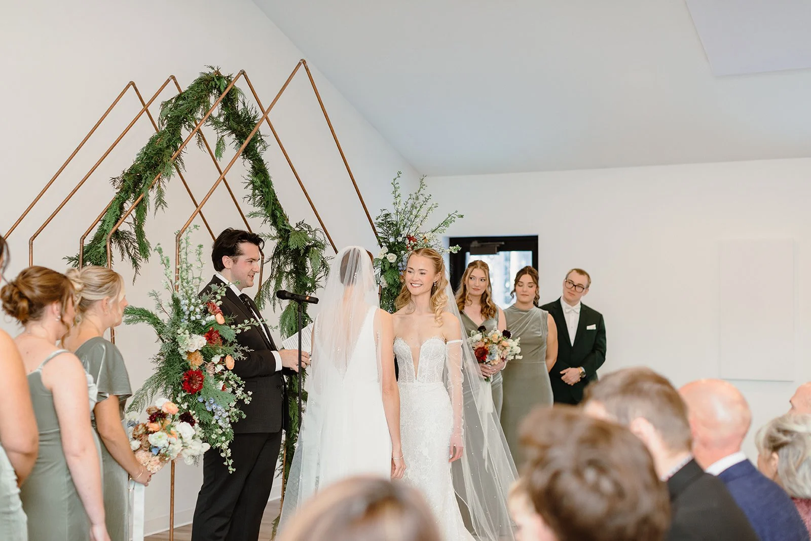 indoor winter wedding ceremony at pinewood in cambridge