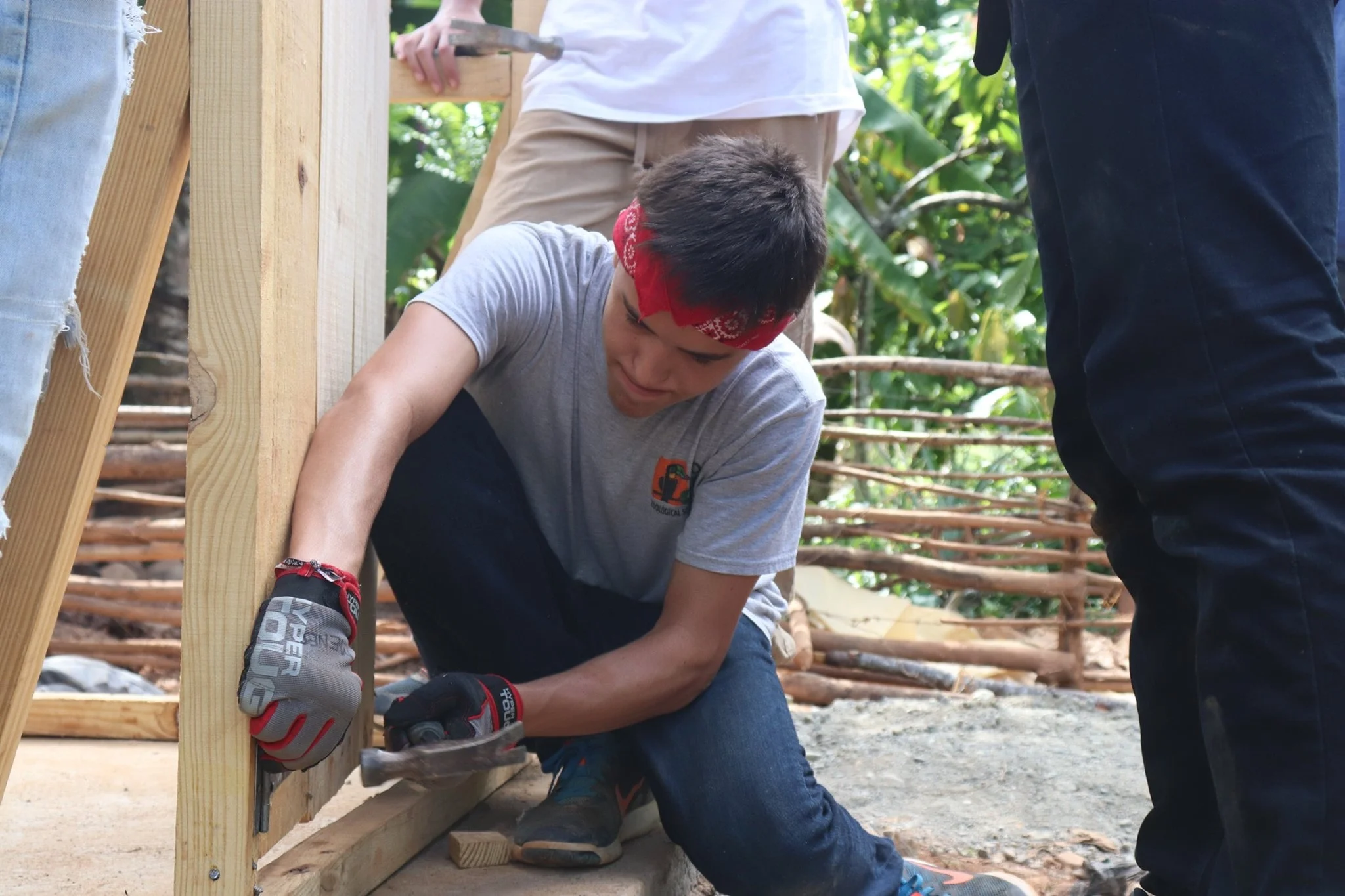 Hammering nails on a ventilated improves pit latrine.jpg