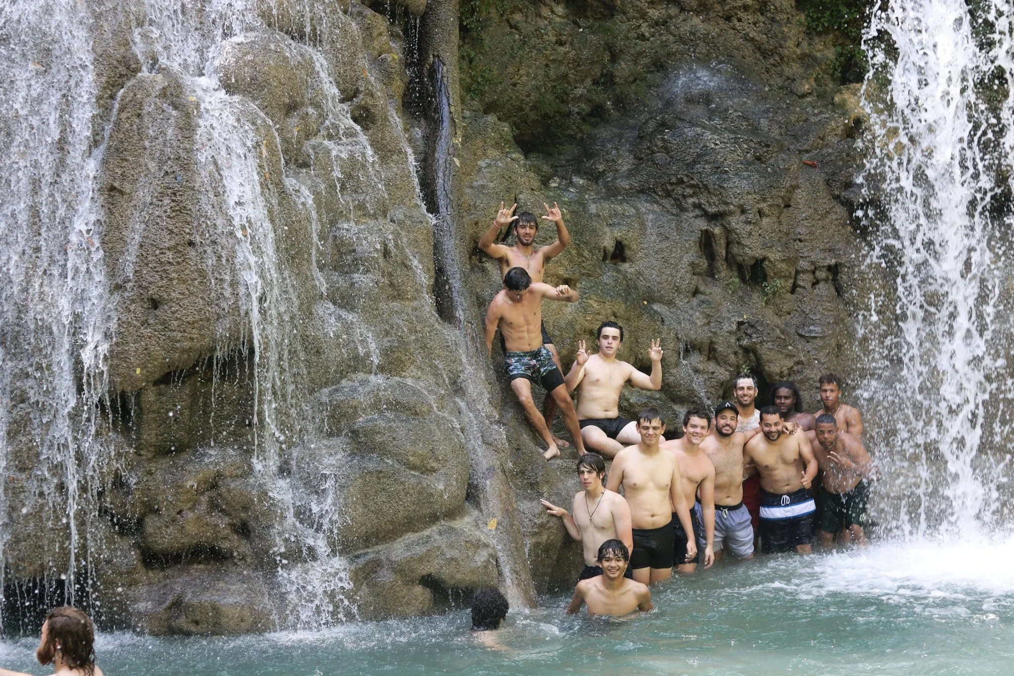 blue-missions-volunteers-shworing-in-local-river-min.jpg