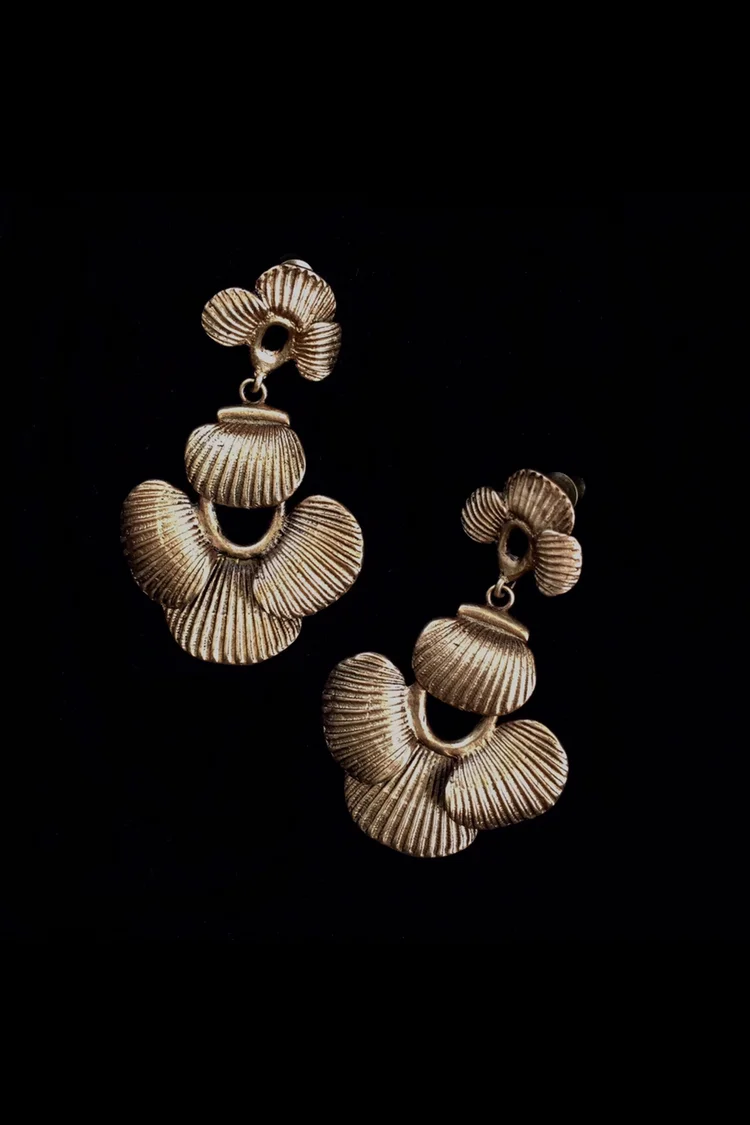 Shell Earrings on black background