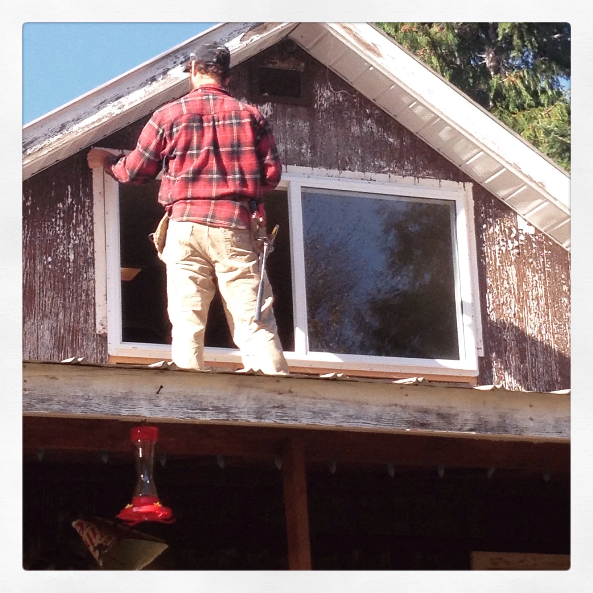 Here is Cam putting in a new window. So handy,