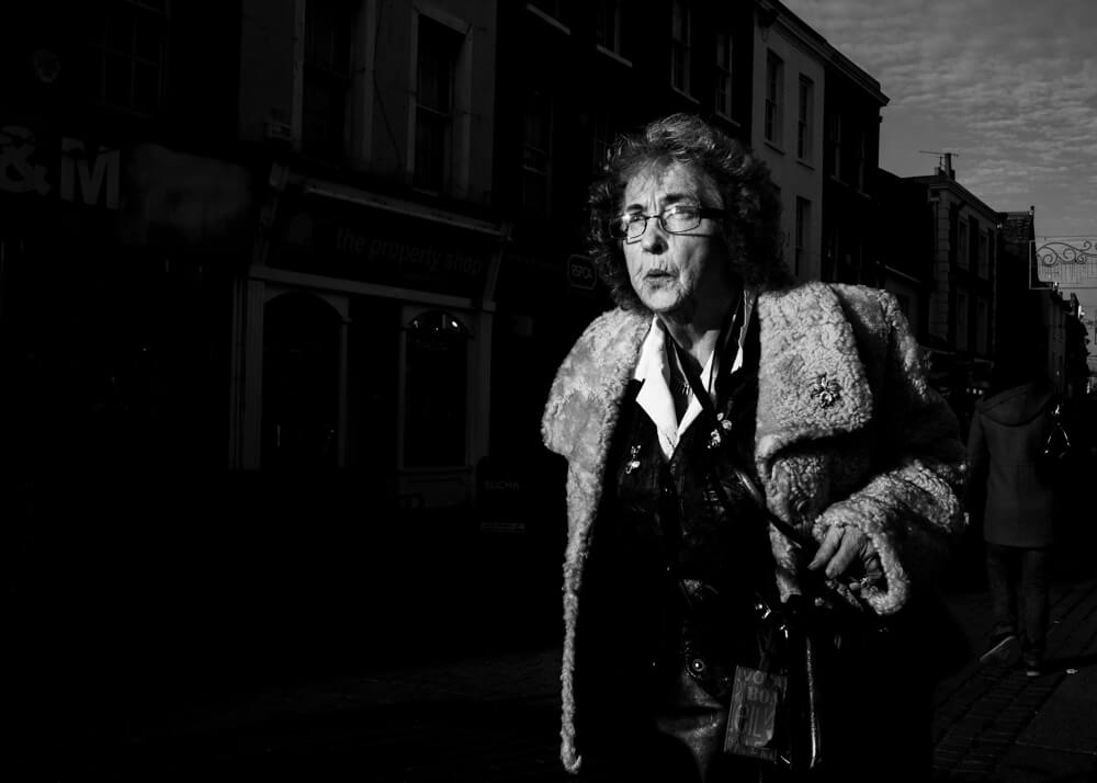 A candid photograph of a women taken in Gravesend, Kent