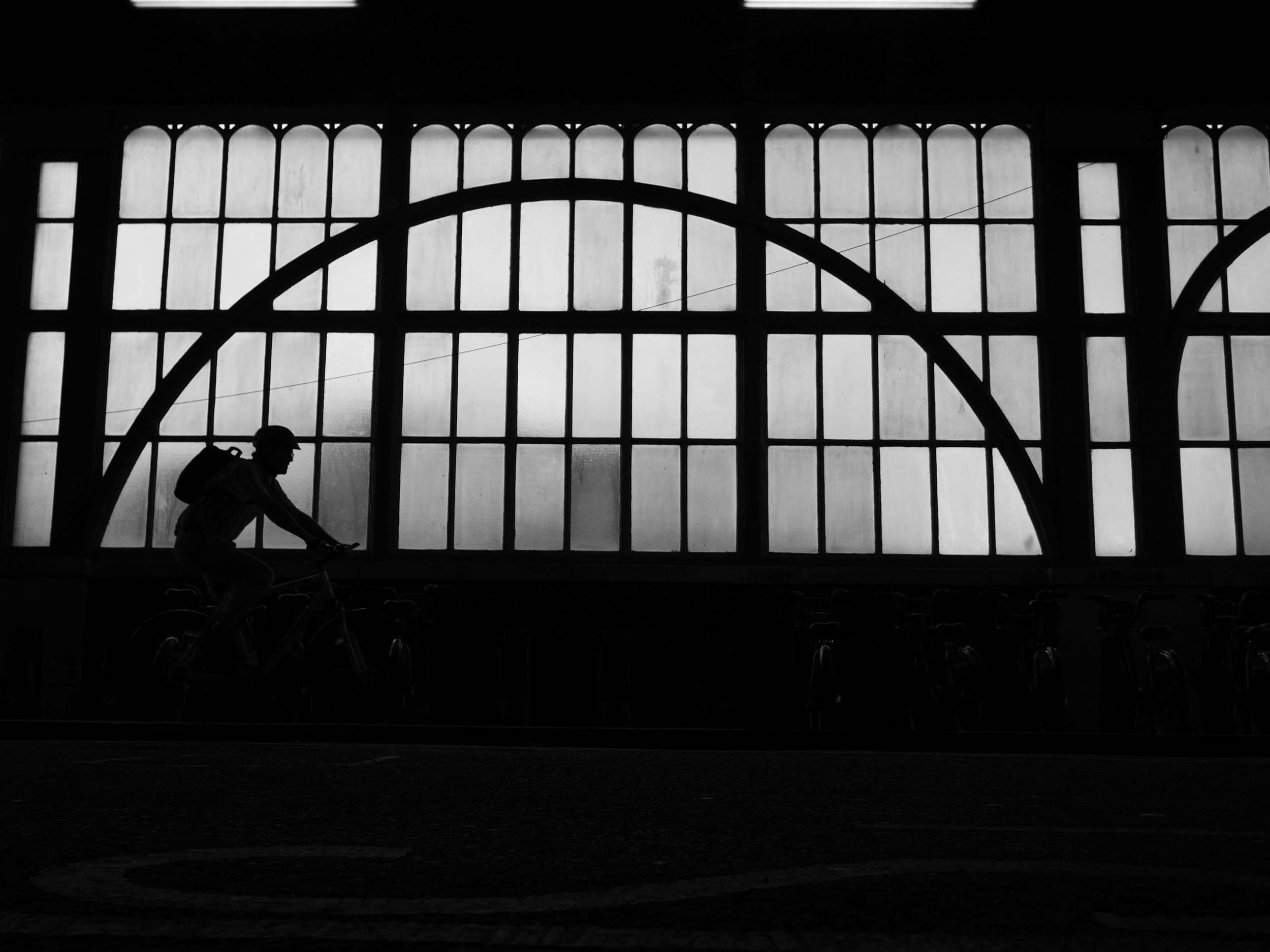 A 4Kphoto silhouette of a cyclist taken just outside the London Waterloo station using LUMIX G7
