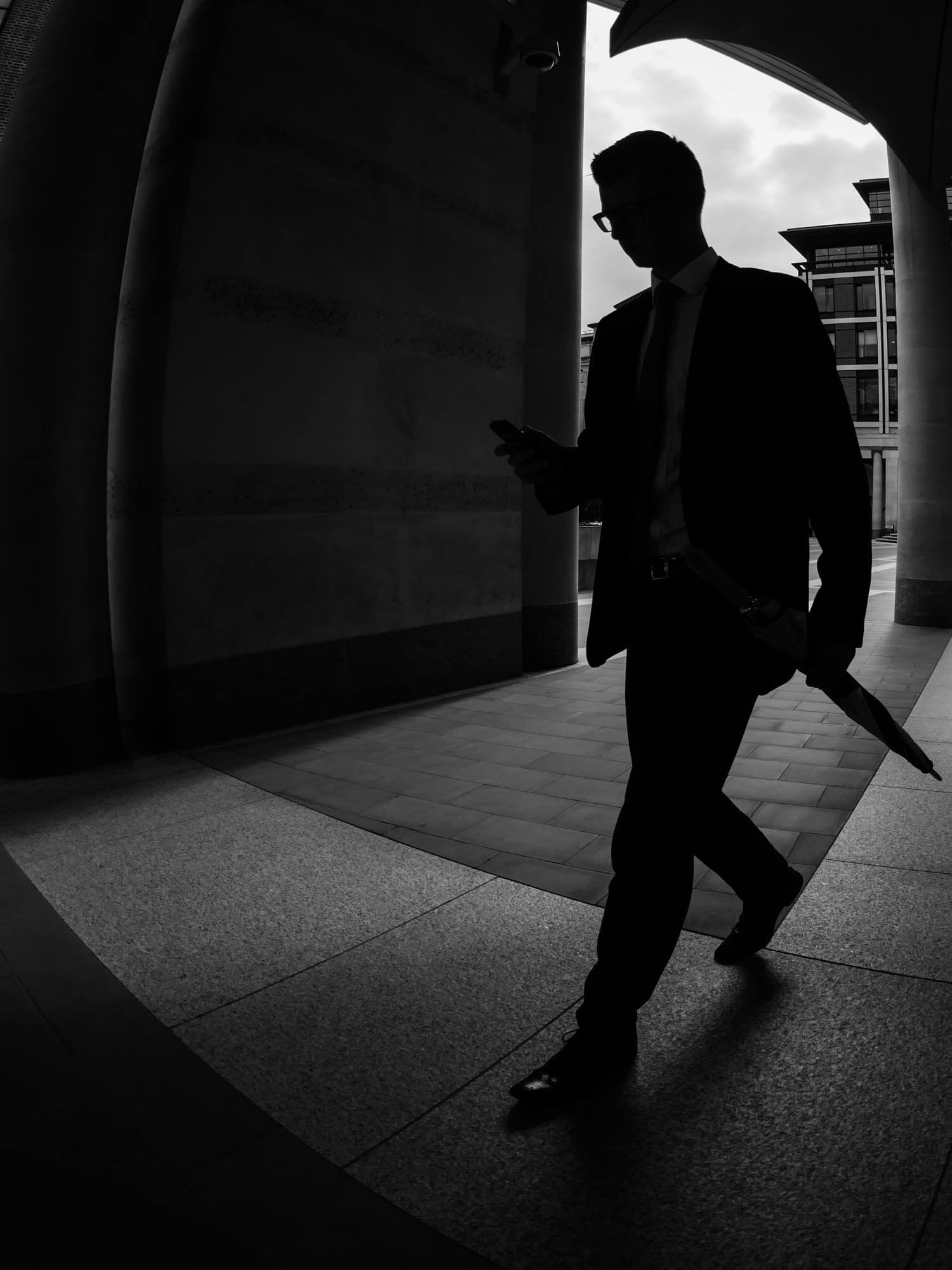 A silhouette of a man taken near London Stock Exchange