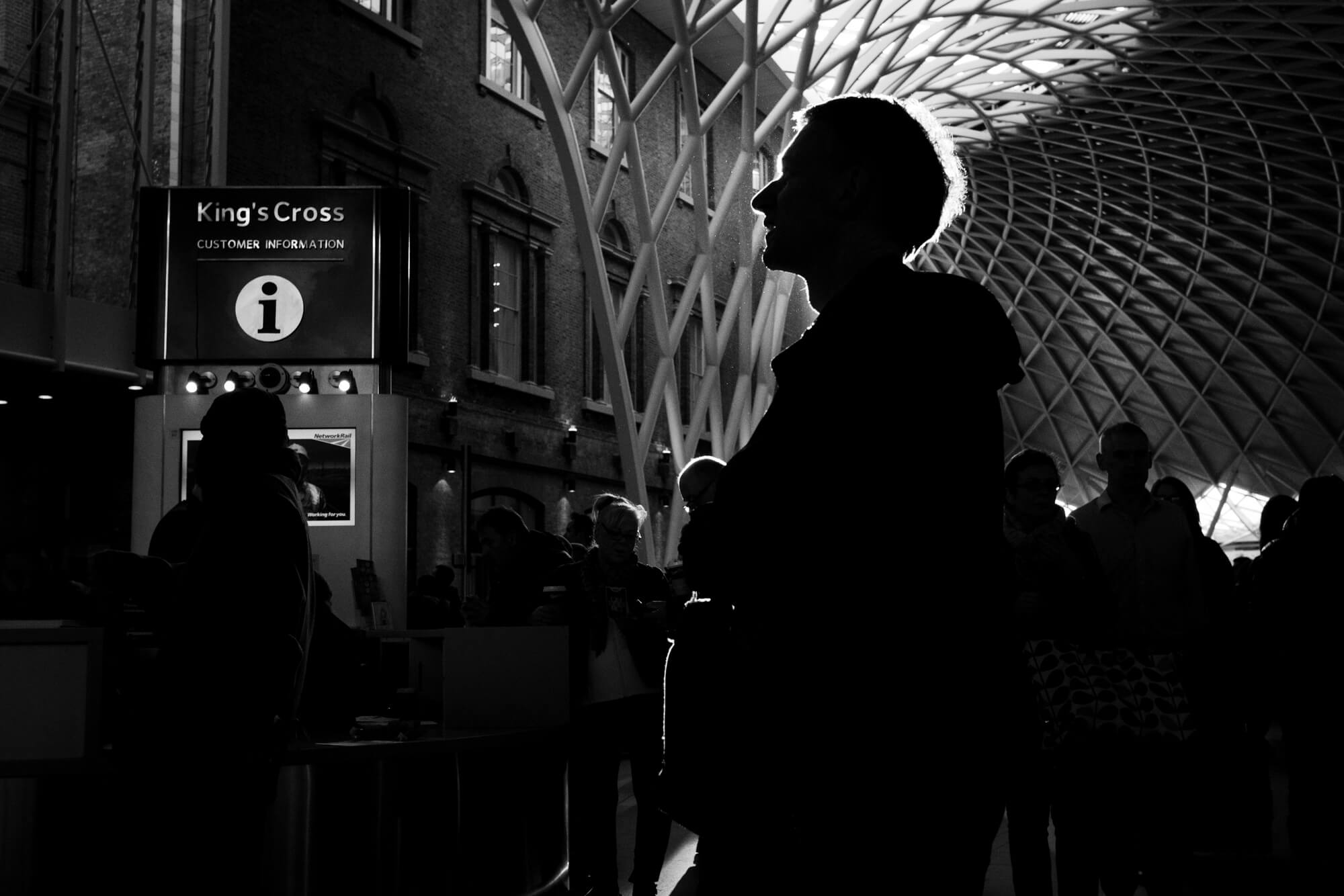 A silhouette of a man taken at King's Cross station in London as part of one to one street photography workshop.