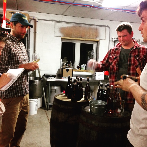 Garrett and Jimmy barrel-tasting Good Life Cider's current and to-be-released