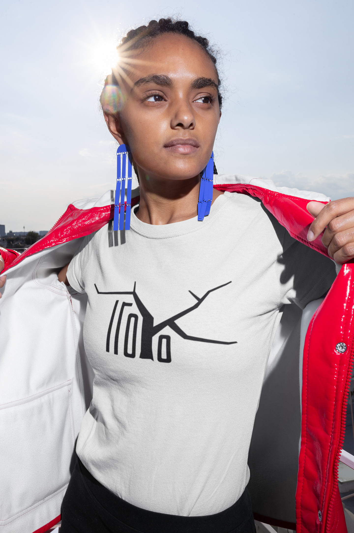 tee-mockup-of-a-woman-with-trendy-blue-earrings-and-a-bright-red-jacket-21815.png