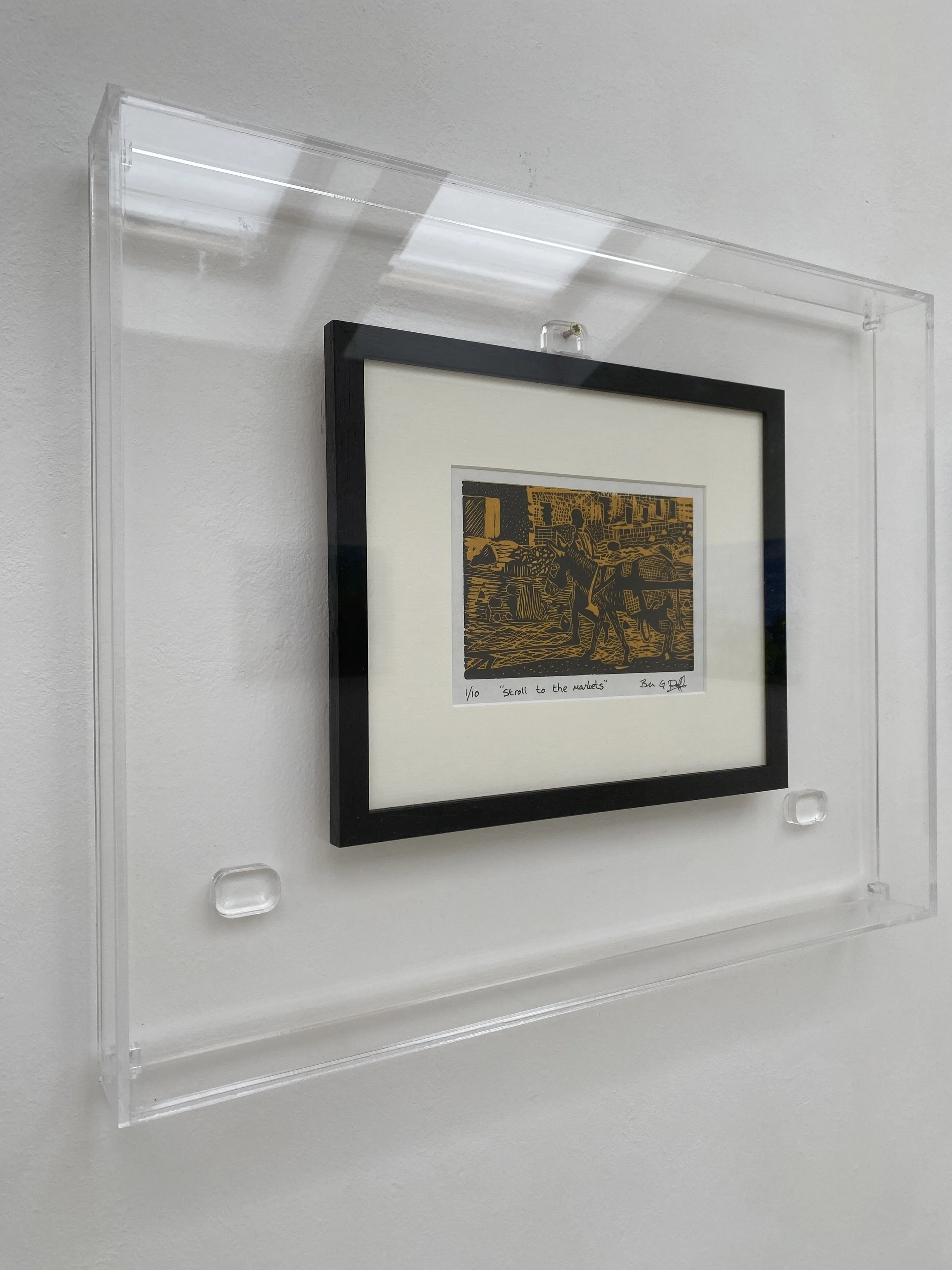 A Stroll to the Market, 2023.
Lino print framed in protection case with text and superglue. Varied size