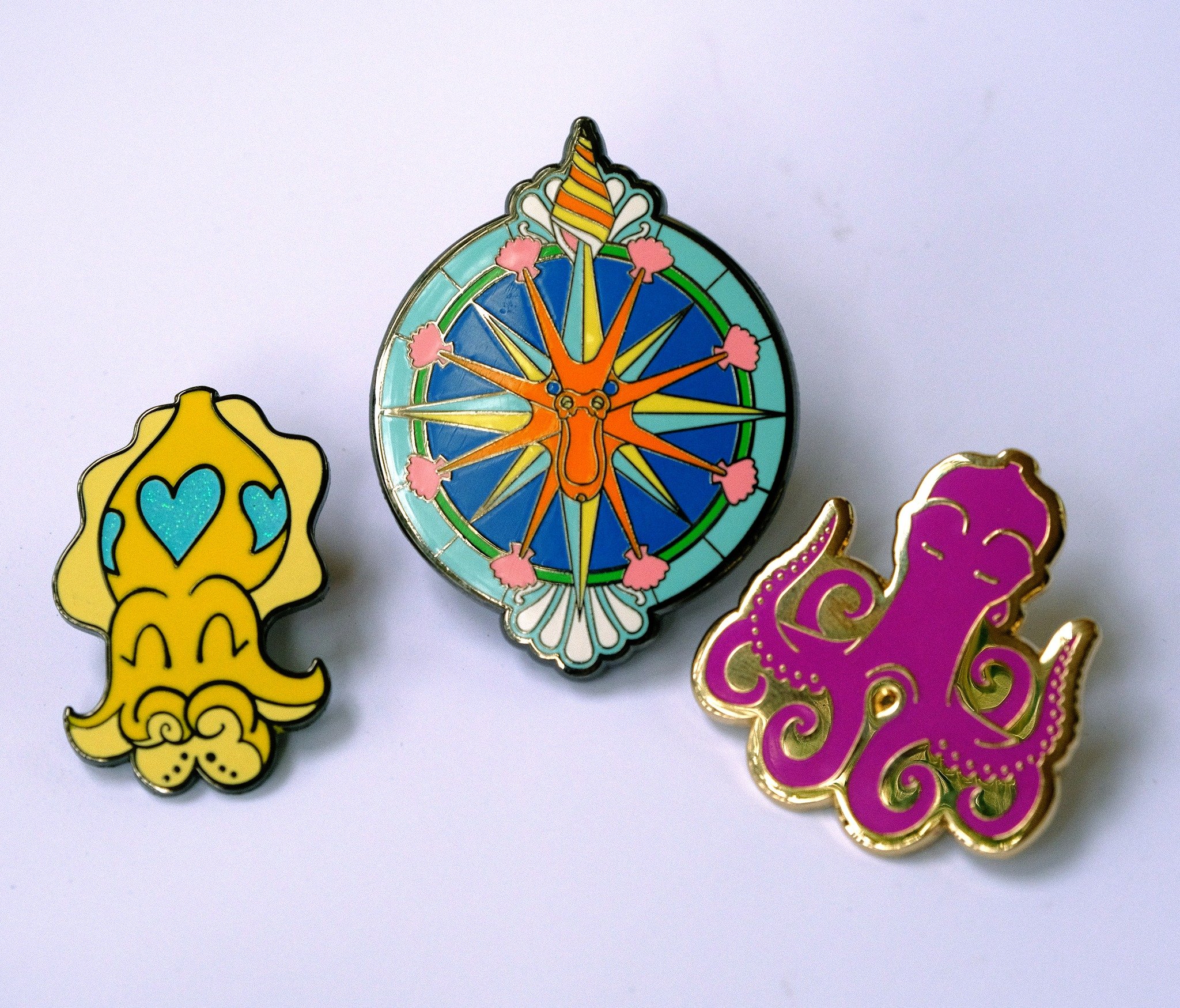 New merch:  Octopolis enamel pins! Available for the first time exclusively at @wondercon this weekend. Of course, if you can't make it to Anaheim you'll be able to order them on the online store shortly afterwards!

.
.
.
.
#wondercon2025 #wondercon