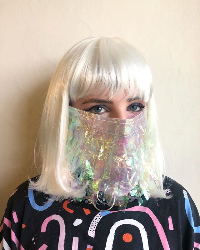 MASK OF THE DAY: I made this cellophane fringe mask to match the iridescent space hood I posted a few masks back but figured it deserved its own feature ✨ #diymask #maskoftheday #mask #ootd #quarantinelooks #quarantinelife