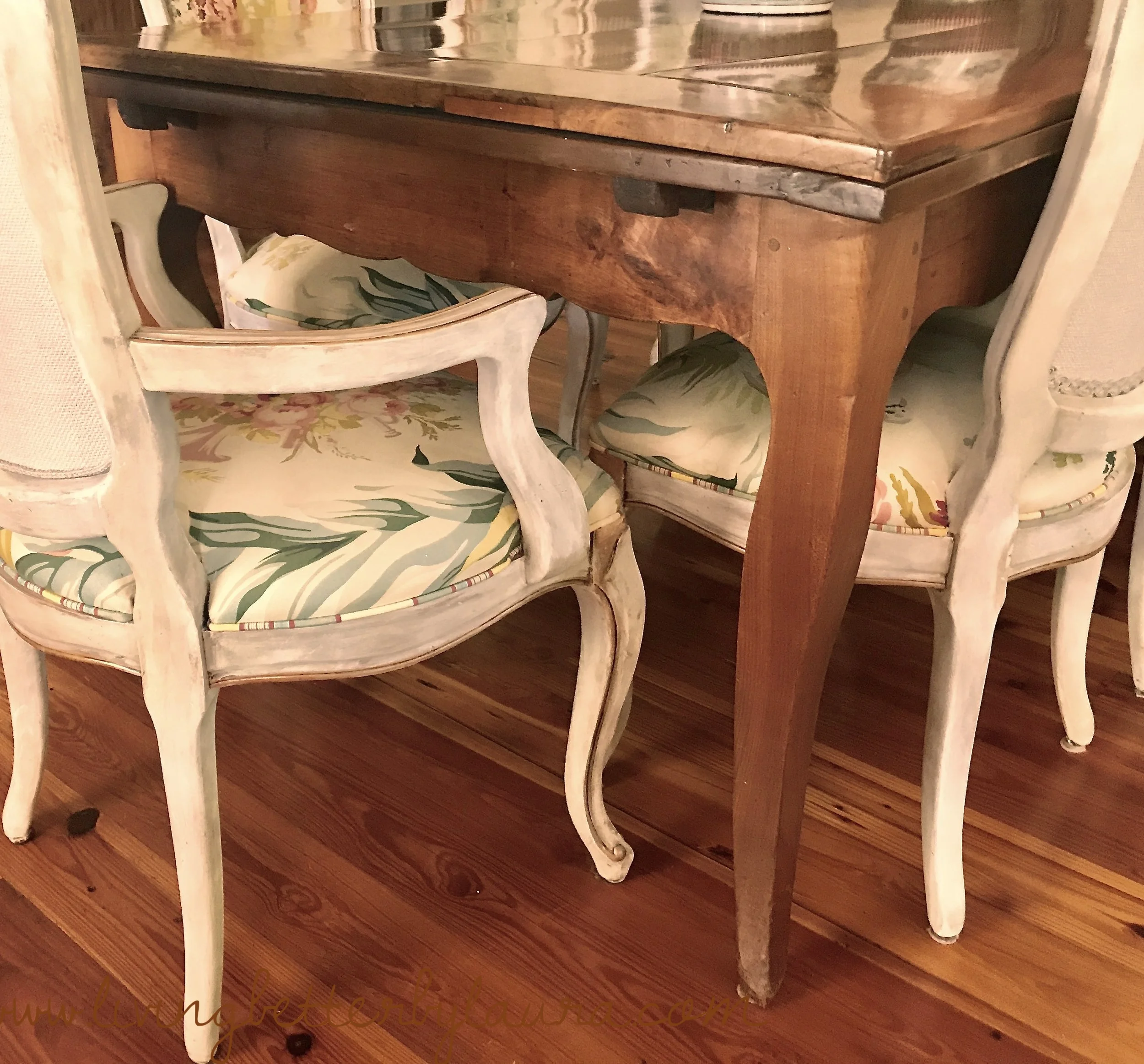 countless families have enjoyed meals on this 18th century antique French draw table over time, including mine. The Chairs are reproduction that I have refinished - post to follow soon.