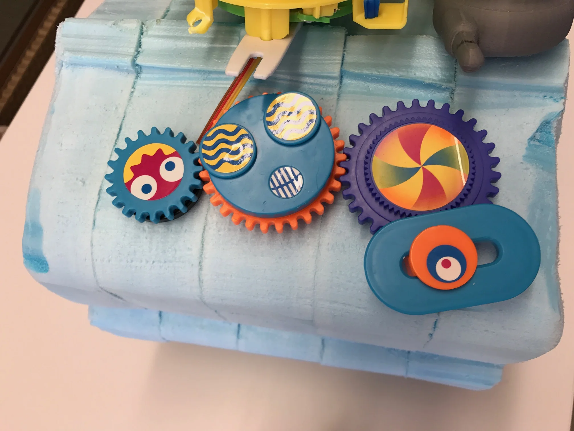 The blue foam model was carved at full scale to evaluate ergonomics and spacing/sizing of the play features.