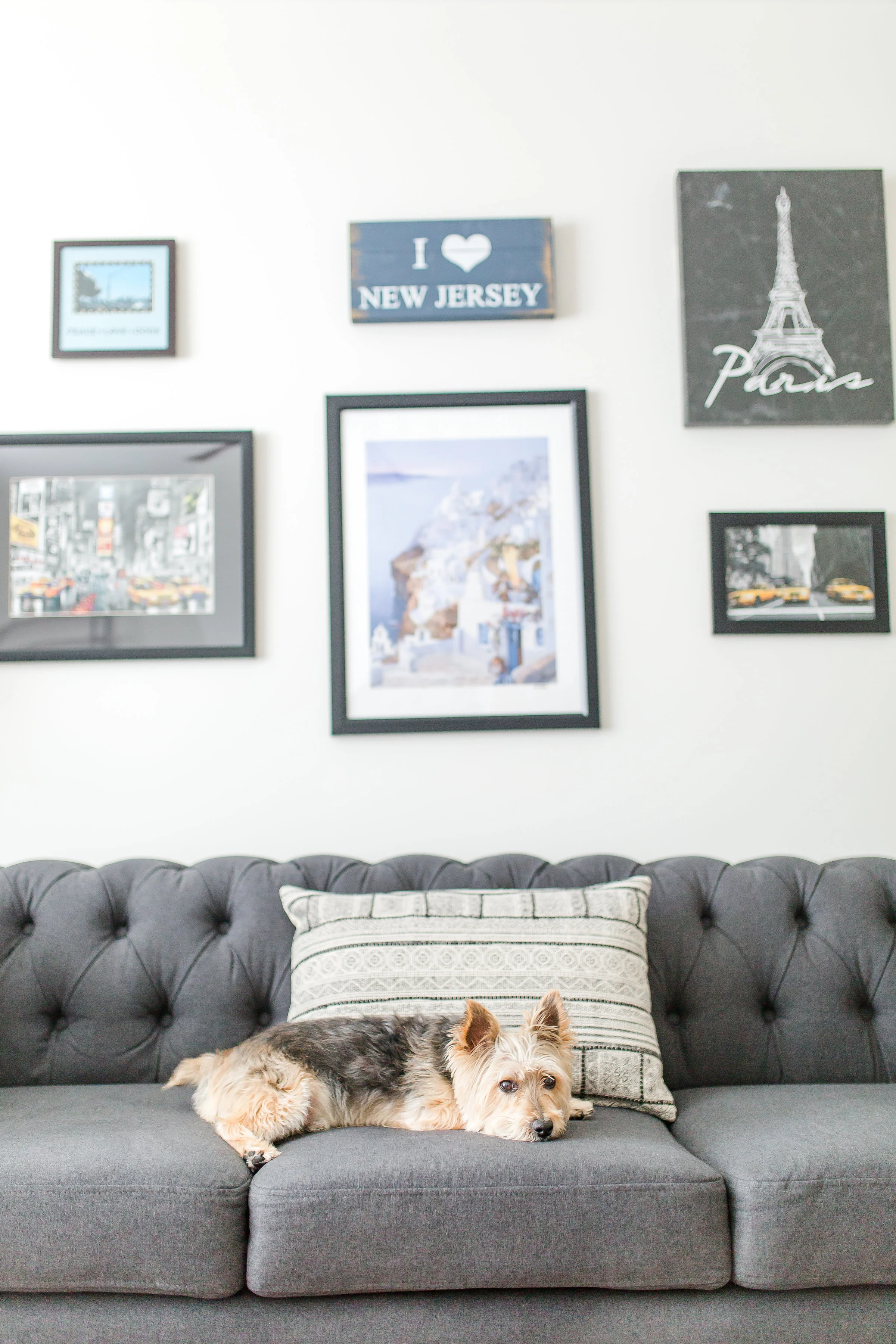 Gallery wall of our favorite places to travel. Greece is right in the middle!