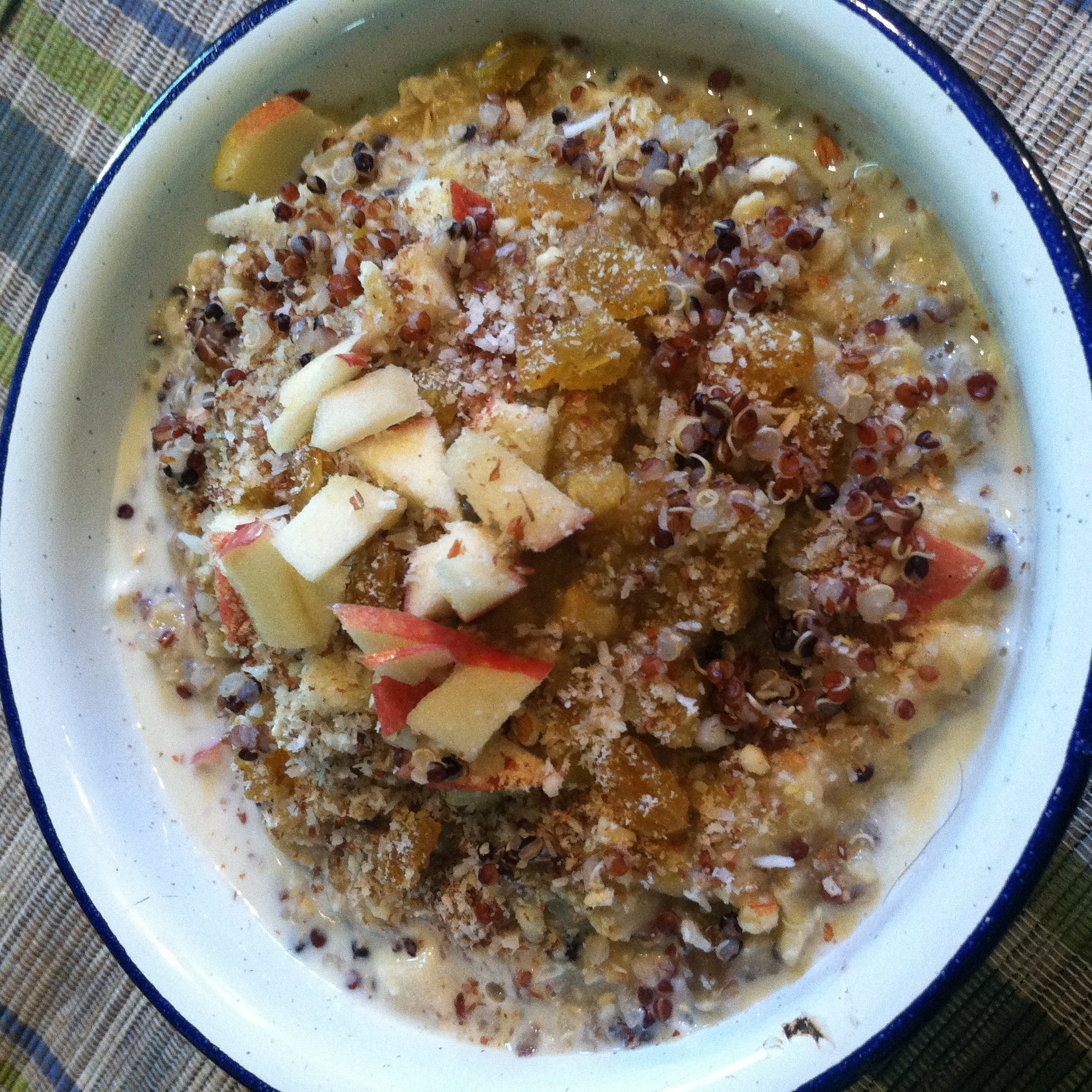 My "leftovers" breakfast bowl: oatmeal, red quinoa, apples, raisins and Dreena's Apple Lentil Dal! Drizzle some maple syrup if you like it sweeter.