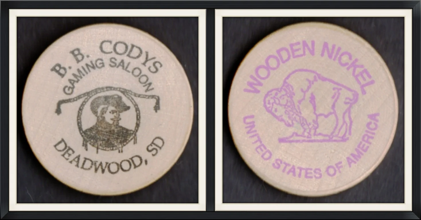 B. B. Codys Gaming Saloon, Deadwood, SD - United States of America - Souvenir, Wooden Nickle