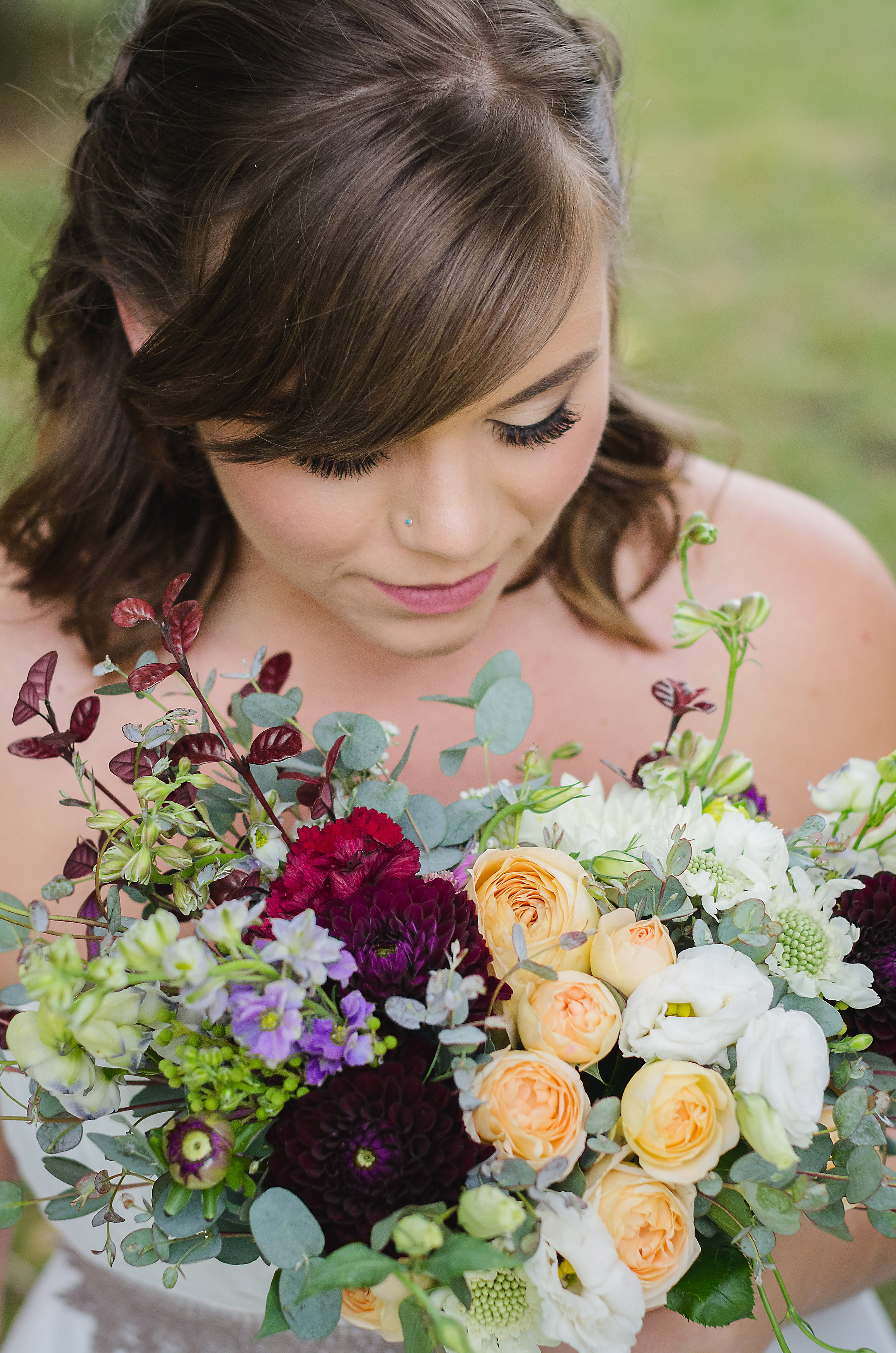 Calgary bride with her colourful bouquet made by Rhosyn Floral