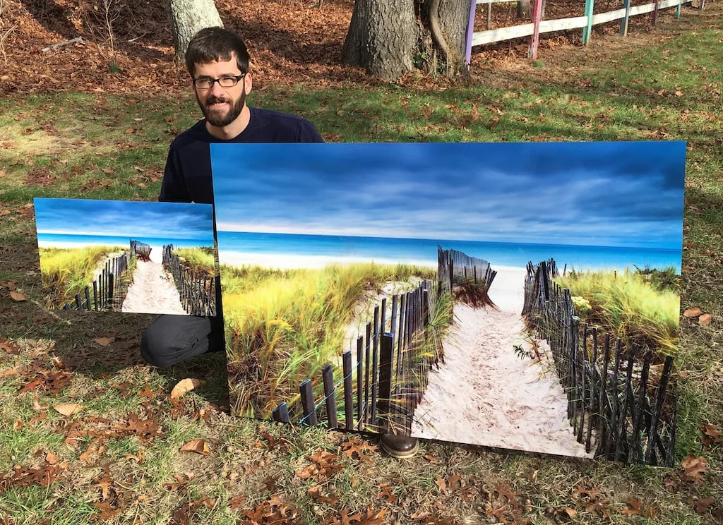 Myself alongside 2 metal prints of "Flying Point Beach Vista"