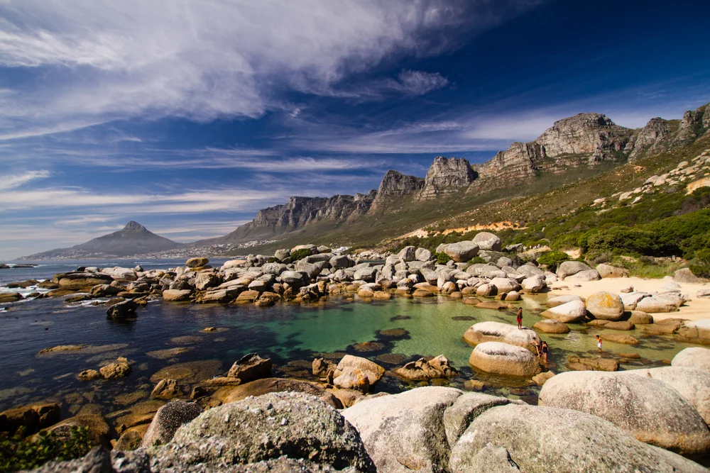 Mountains on the edge of the calm blue ocean.jpg