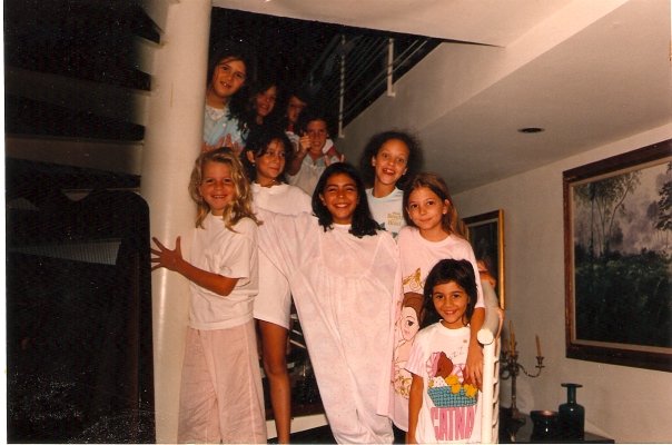 I told you I'd try to find an old photo of that party. Oh boy!...There I am, with the Belle nightgown second on the right from bottom to top.&nbsp;