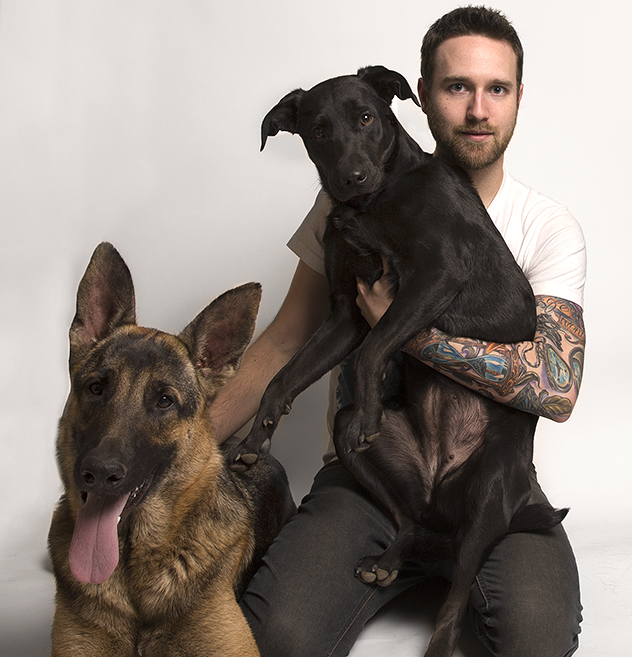 Aaron Seminoff, founder of Everything Vegan and his adorable rescue dogs Link and Zelda