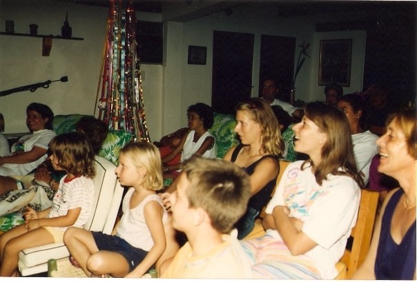 (My little beach family, watching our little puppet theater productions. I can't believe I still have this photo!)