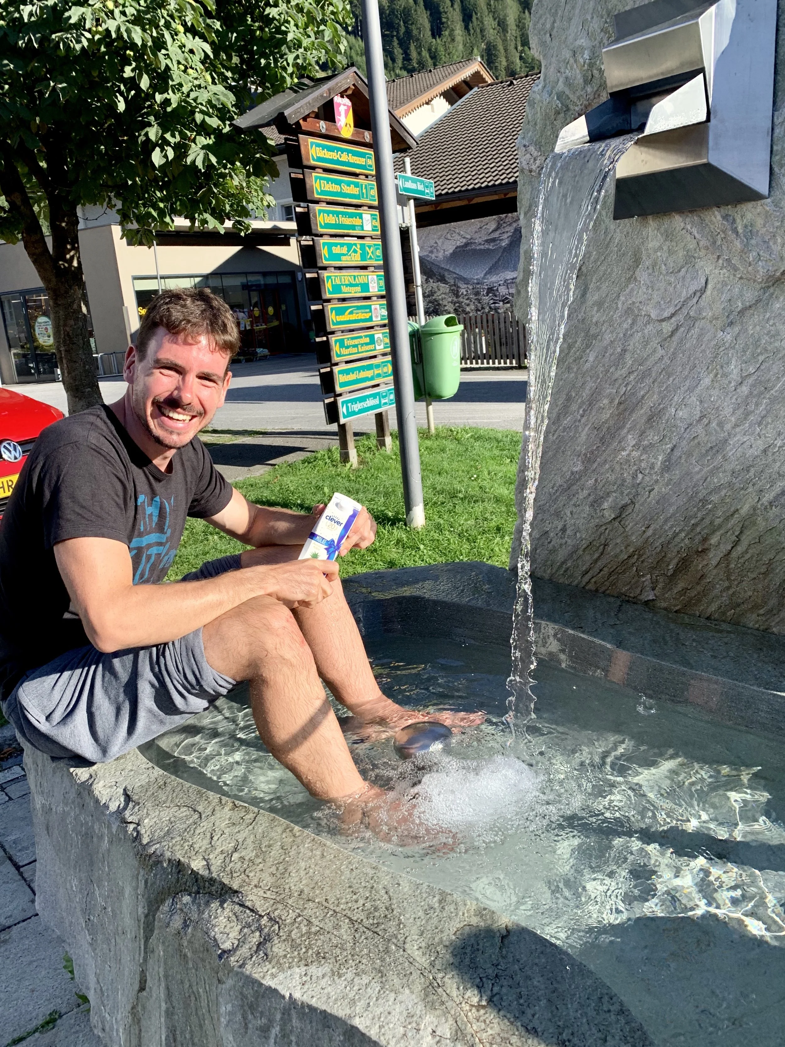 Relaxing and cooling our feet in the local spring