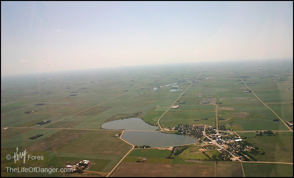 A landscape partitioned into uniform squares. Even a lake wasn't enough to alter a road's course.