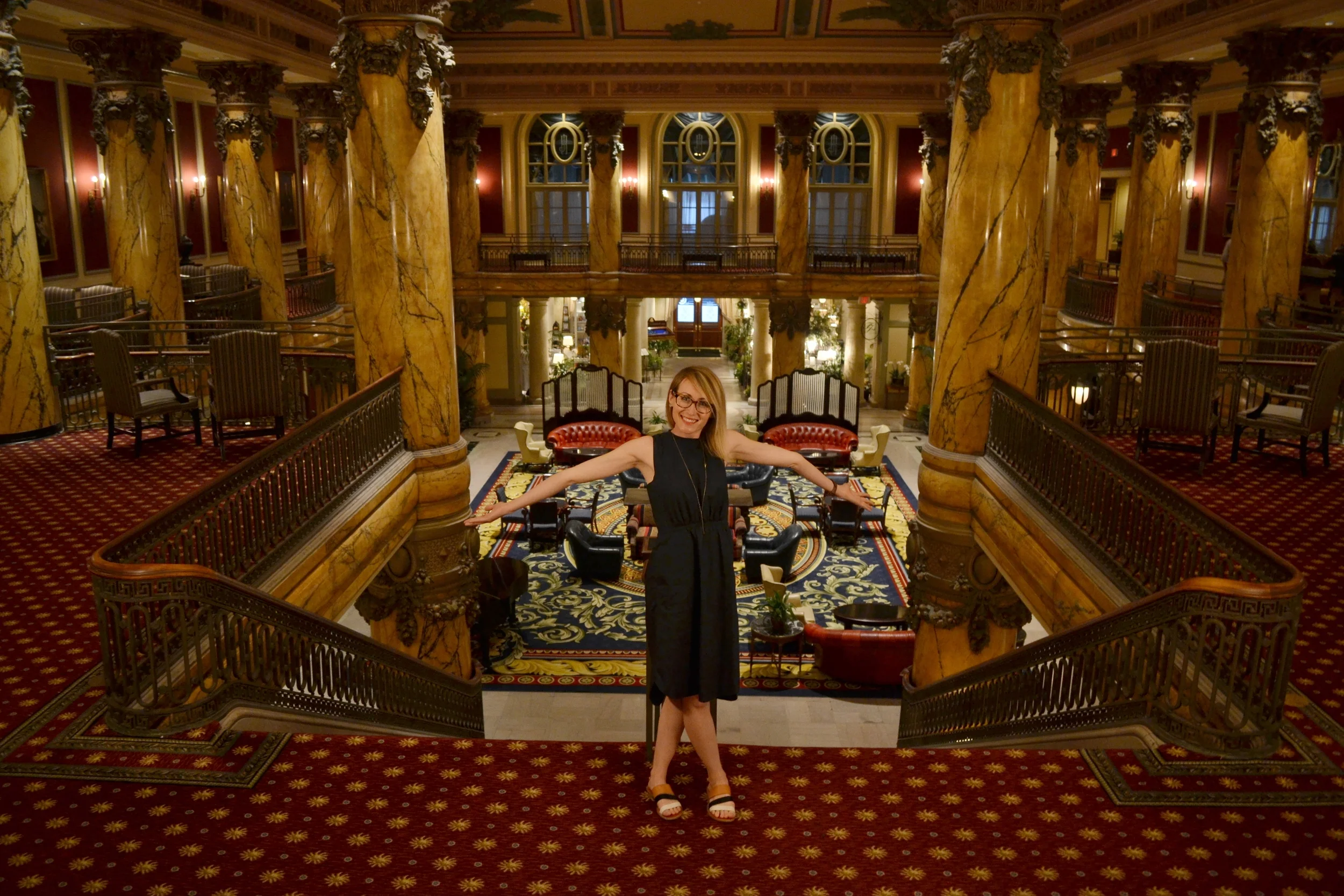 Mel is happy to show off the grand staircase at The Jefferson.