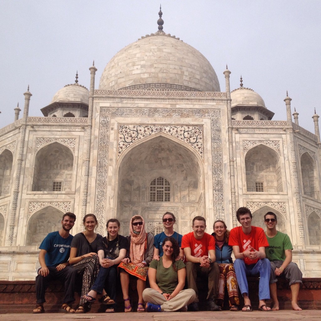 India group sitting in front of the Taj Mahal