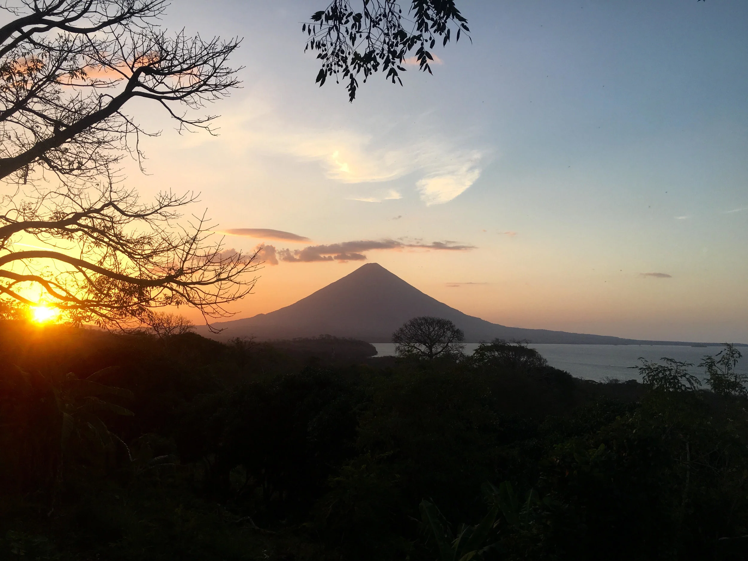 The view from the farm as the sun sets over Volcán Concepción.