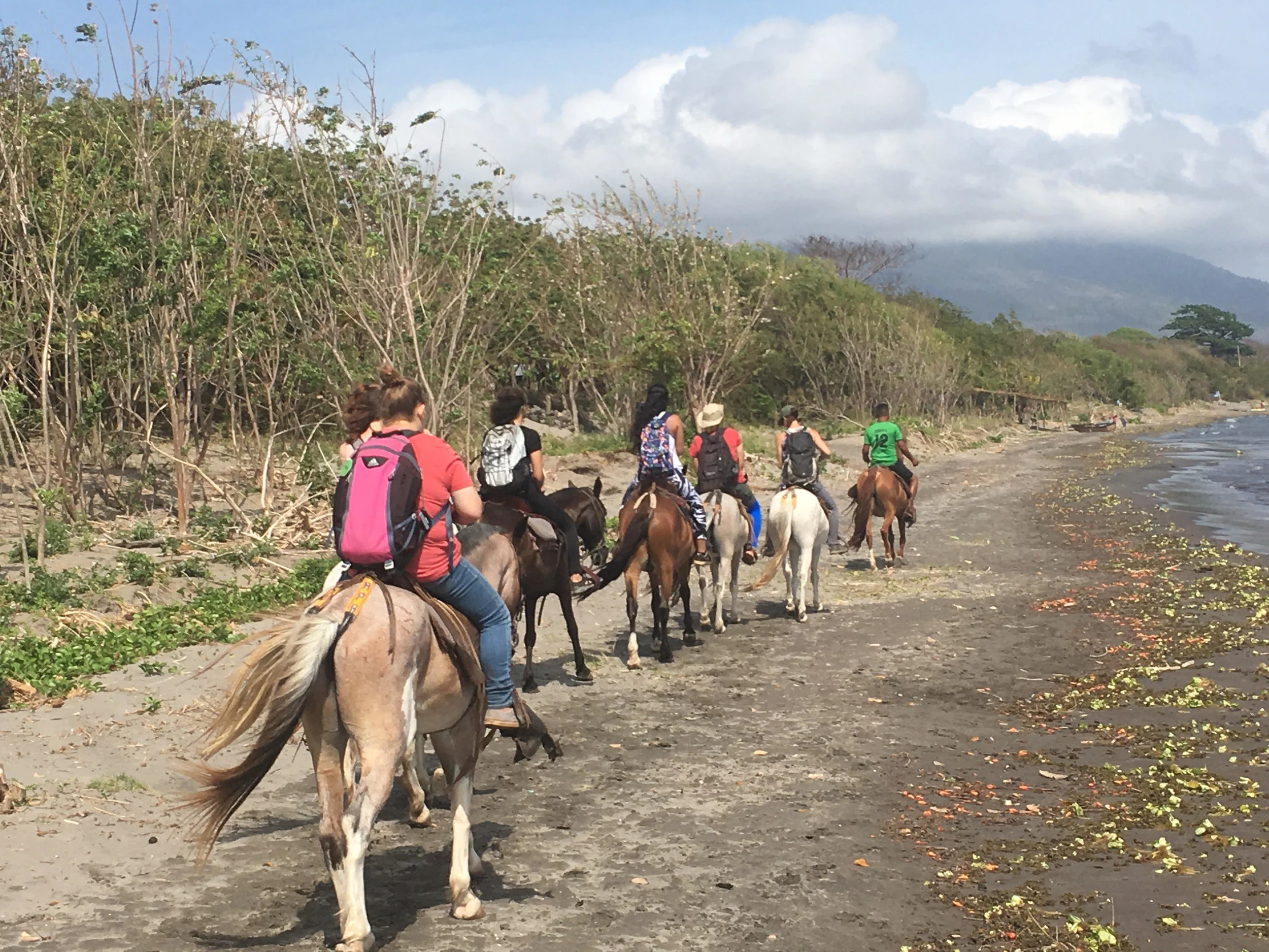 First time: riding horses on a beach
