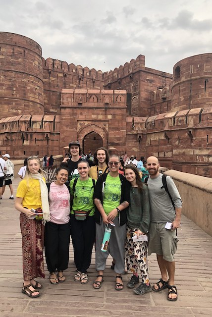 The whole group (at the Red Fort) just before the rain.