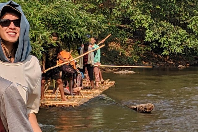 Riding traditional bamboo rafts down the Mae Ping river north of Chiang Mai.